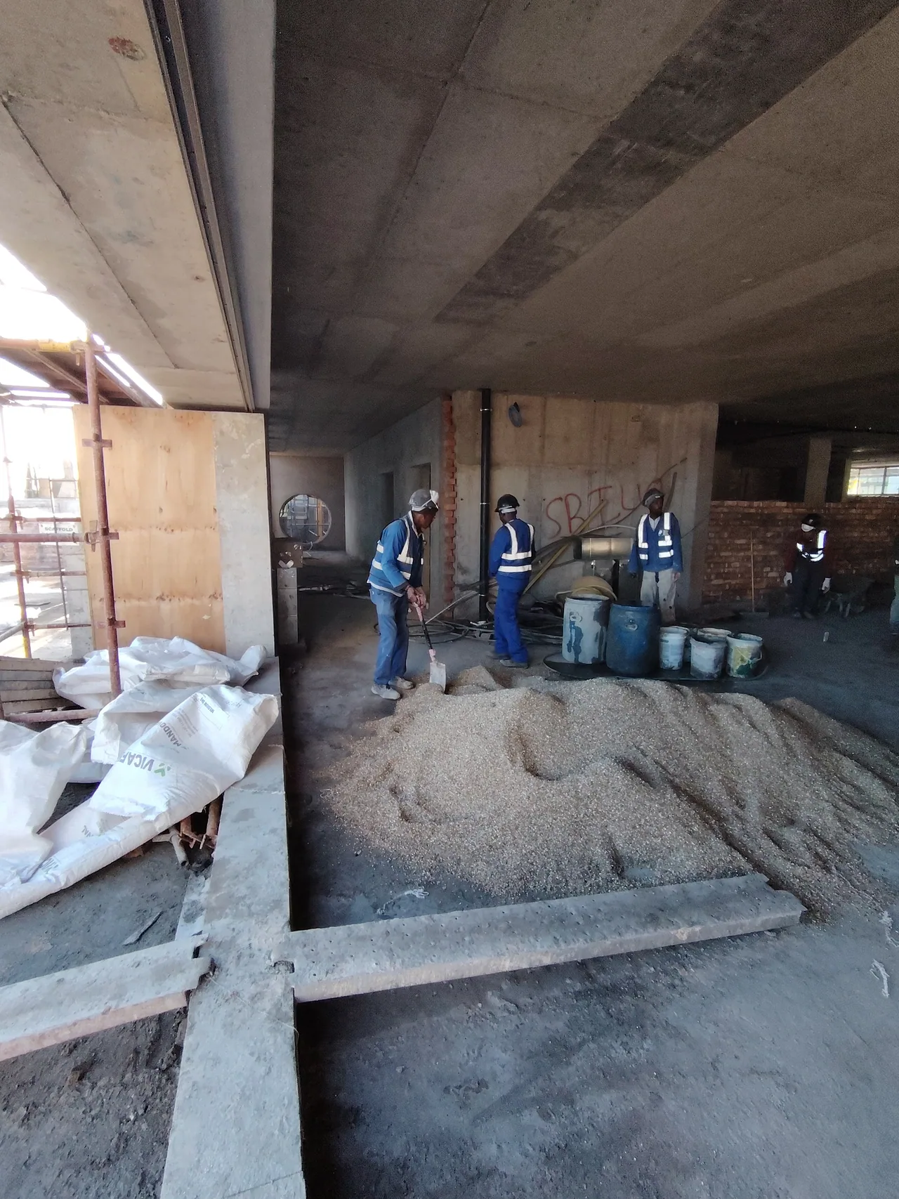 Construction crew preparing the internal floor build-up